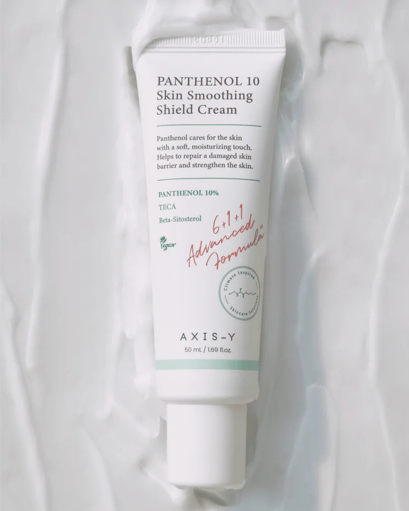 Axis-Y Panthenol 10 Skin Smoothing Shield Cream in a background with cream